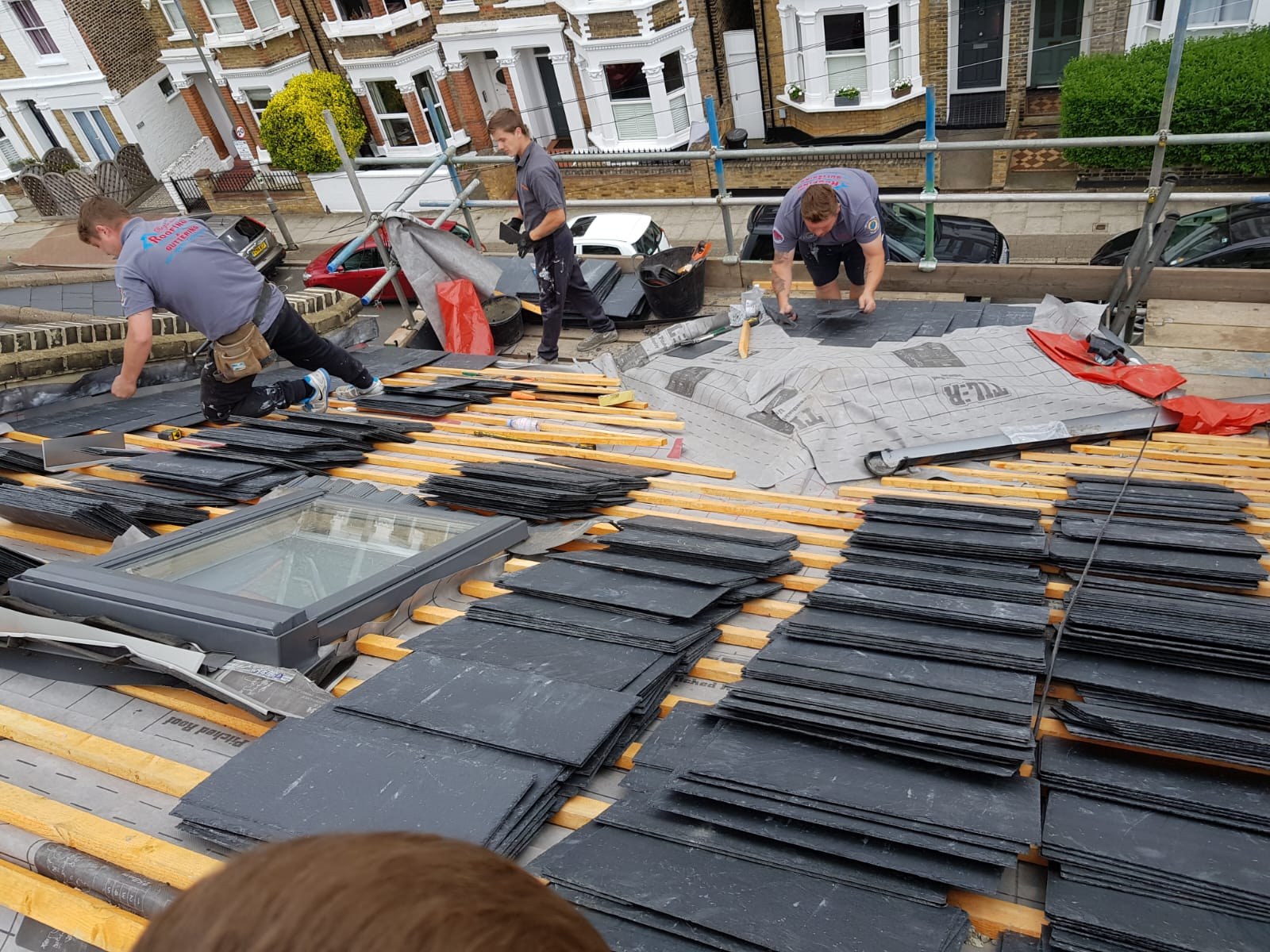 Regional Roofing team installing a slate roof